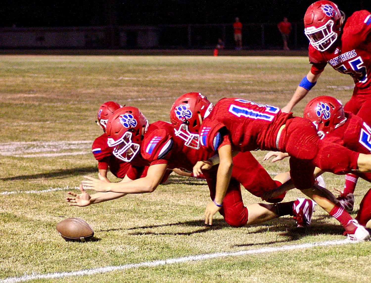 Alba-Golden recovers the opening on-side kick-off in last Friday’s contest against Harmony.
